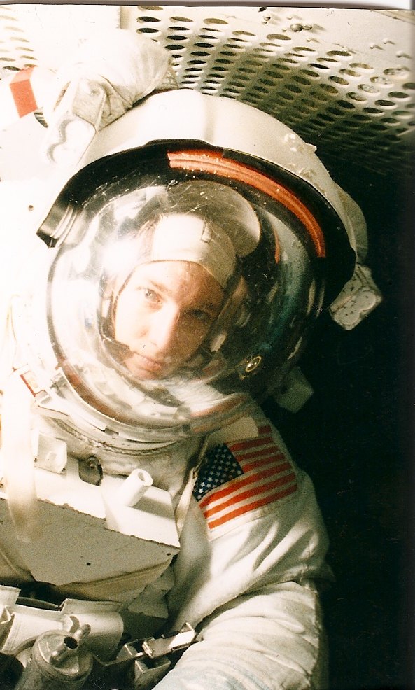 Brandt Welker in a NASA EMU spacesuit at the Neutral Buoyancy Laboratory.